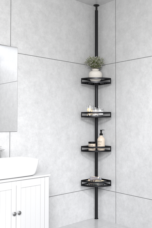 Black bathroom tension pole shelf installed in a shower corner