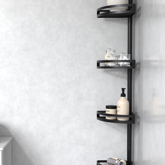 Black bathroom tension pole shelf installed in a tiled shower corner
