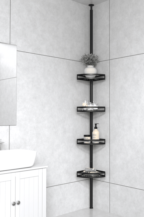 Black bathroom tension pole shelf installed in a shower corner